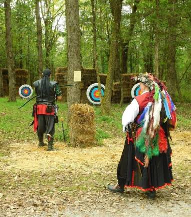 Knights and faeries roman the woods of Sparta Pirates attending the Sparta Renaissance Festival try their hand at archery on Saturday, September 15, 2018. Photos by mandy Coriston