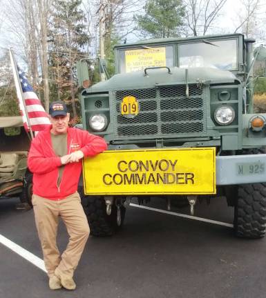 Toy Train makes Sparta stop Randy Emr of the Military Transport Association.