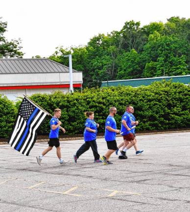 Photos: Special Olympics Torch Run Law enforcement members carry the Special Olympics torch in Franklin. This year, about 3,000 people were expected to take part in the run, a day-long event split into 26 legs. The run travels through more than 300 towns, covering 750 miles. The Summer Games will be June 9-11 at the College of New Jersey. (Photo by Maria Kovic)