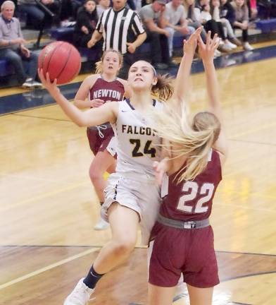 Jefferson's Mackenzie Rock (24) is in the midst of a shot in the second quarter.