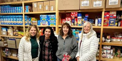Members of the Newton Country Club Ladies Golf Association visit the Samaritan Inn food pantry in Newton. (Photos provided)