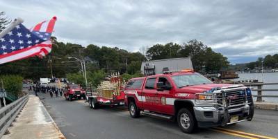 A Hopatcong Fire Department vehicle pulls a trailer carrying trophies to be awarded later Saturday, Oct. 7. (Photos by Daniele Sciuto)