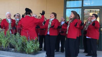Harmony in Motion sings Christmas carols at the Season of Hope Kickoff Celebration on Nov. 3. (Photos by Kathy Shwiff)