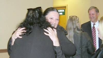 An ecstatic Danielle Varon celebrates her not guilty verdict with animal supporters.