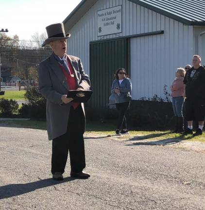 Veterans honored with parade, ceremony U.S. Marine Corps veteran William Joseph, the Sussex County town crier, speaks at the beginning of the parade.