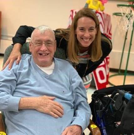 Rep. Mike Sherrill visiting a fire service retiree at the New Jersey Firemen’s Home.