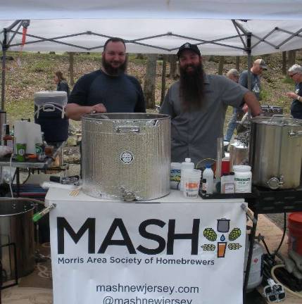 Homebrewers take their craft camping MASH-NJ Treasurer Micha Stark (left) and President Karl Weiss celebrate National Homebrew Day, Saturday, May 5, 2018 at the Great Divide Campground in Andover. Photos by Mandy Coriston