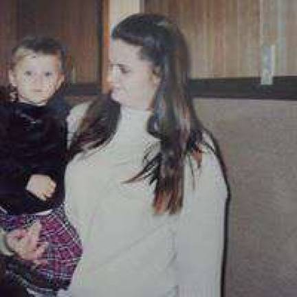Mommy & Me Contest Brandi Kerr of Polk, Pa. holding Erica at a family Christmas party.