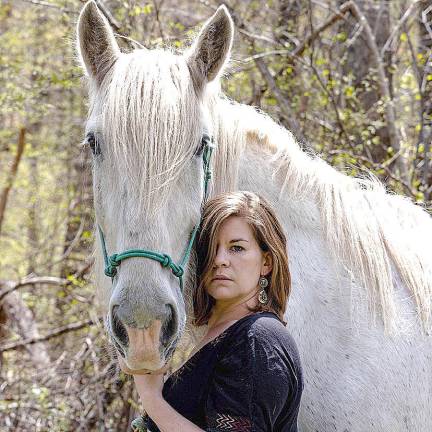 Wildish Way helps empower women through archery and animals Meghan Hindi also includes animals as part of her therapy sessions.