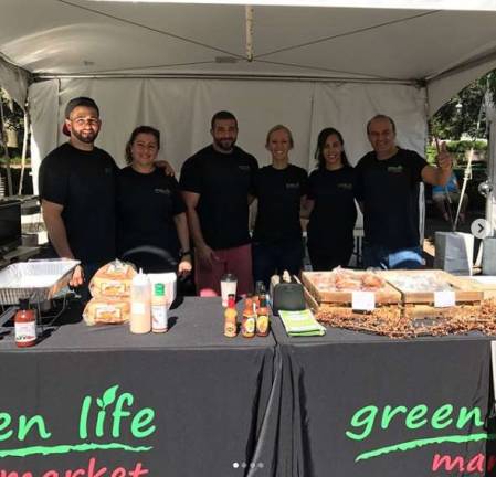 Yassin family spreads the Green Life in Andover Ramez and Alaa Yassin (center) spend a lot of time at the Andover store. They are pictured here with the Andover Green Life staff.