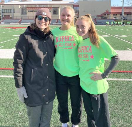 From left are Coach Emily Wisneski and field hockey players Alexa Shotwell and Ashley Smith, who were named to the All-Sussex County Second Team.