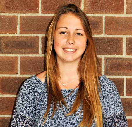 Lexi Gray receives caring award Lexi Gray