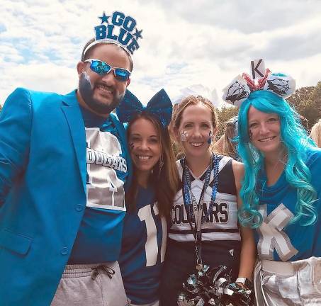 Making noise and wearing blue From left to right: Josh Reed, Tara Jones, Mary Houghtaling, Melissa Fischer at the Kittatinny Regional High School pep rally. Teachers were asked to wear school colors to show their school spirit along with students.