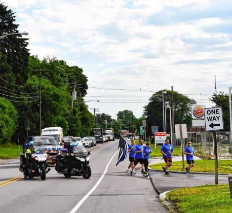 Photos: Special Olympics Torch Run Participants in the Law Enforcement Torch Run for Special Olympics New Jersey have a motorcycle escort Friday morning, June 7 in Franklin. (Photo by Maria Kovic)