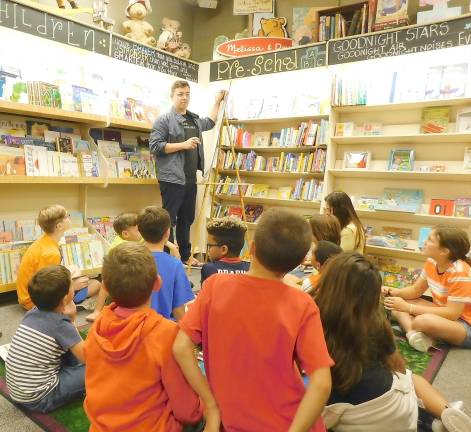 Kids 'touch zombies' and play Mad Libs with author Max Ballier at Sparta Books Best-selling author Max Brallier plays post-apocalyptic MadLibs with fans at Sparta Books on Tuesday, Sept. 17, 2019.