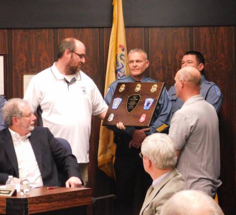 Township promotes police officers, thanks outgoing chief Township promotes police officers, thanks outgoing chief