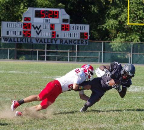 Lenape Valley smothers Wallkill in high school football Lenape Valley defensive back Connor Johnson takes down Wallkill Valley receiver Alfred Boye-codjoe. Boye-codjoe had a very productive day running 60 yards after catching the ball for a touchdown and another long gain on the ground for 83 yards resulting in a touchdown.