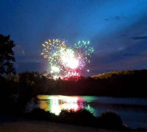 Music, fireworks and fun at Andover Township Day Fireworks marking the end of Andover Township Day at Hillside Park reflect in the waters of nearby Lake Iliff Photos by Mandy Coriston