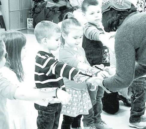Preschool classmates at the Little Sprouts Early Learning Center learn all about butterflies from the Sussex County Master Gardeners at a recent presentation.