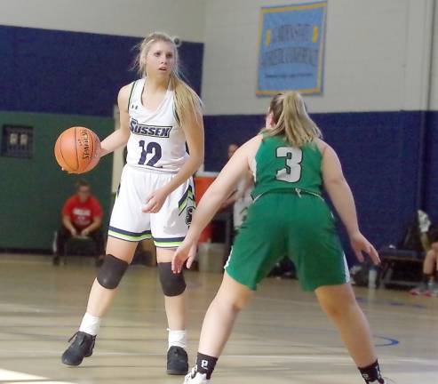 Sussex County's Alyssa Aragona handles the ball while covered by Ocean County's Molly Collins in the second half.