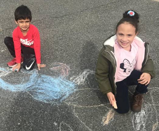 School Violence Awareness Week concluded during recess with Chalk It Up for Peace.