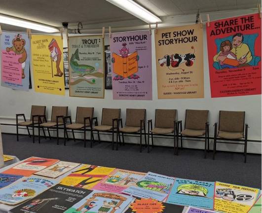 JoAnne Daniels has created posters for the hundreds of library programs each year.