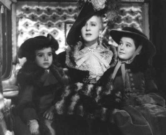 Norma Shearer (center) plays the title character in Marie Antoinette (1938) with Marilyn Knowlden (right) and Scotty Beckett (left) as her children. Photo provided courtesy of Marilyn Knowlden