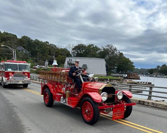 Old and new Franklin firetrucks are driven in the parade.