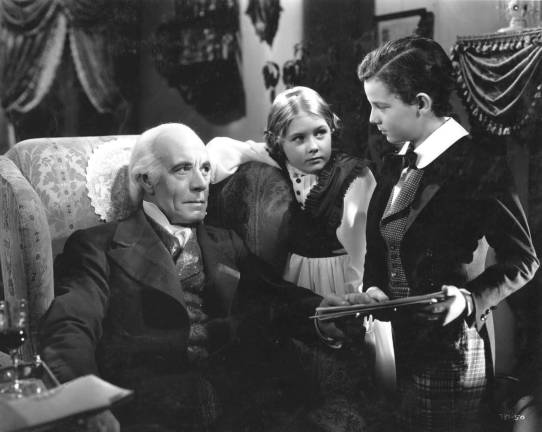 Marilyn Knowlden (center) acts in &quot;David Copperfield,&quot; the 1935 classic based on the Charles Dickens novel. To her left is Lewis Stone. On her right is a young Freddie Bartholemew. Photo provided courtesy of Marilyn Knowlden.