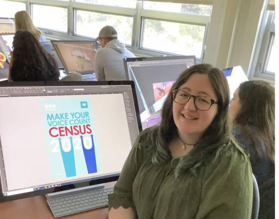 Hewitt at SCCC with her winning design for the 2020 Census.