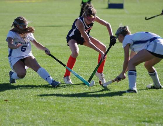 Kittatinny defeats Mountain Lakes A Mountain Lakes Laker and Kittatinny Cougars battle for the ball.