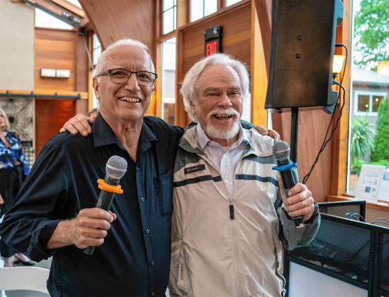 Photos: Casino Night fundraiser <b>DJ Ray Sikora, left, with Robert Butler performing karaoke.</b>