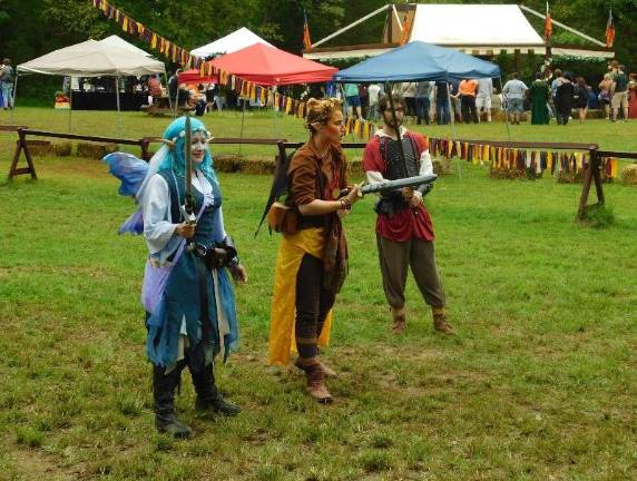 Knights and faeries roman the woods of Sparta The Sparta Renaissance Festival offered squire training for young children. The instructors included the Blue Faery, an elf, and a royal squire.