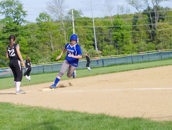 Kittatinny's Kelly Insalaco rounds third base on the way home to score in the sixth inning.