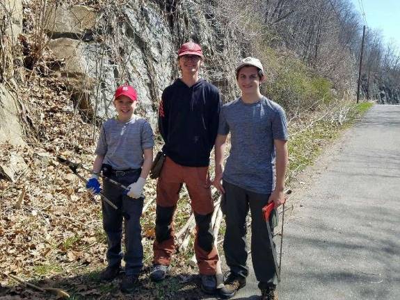 Boy Scouts uphold tradition, give back From left, Scout Joshua Enberg, Jr. Asst. Scoutmaster and Eagle Scout Dylan Gerisch, and Troop Instructor Eddie DiTomasso of Troop 95 from Sparta, participate in Beaver Day at Camp Somers, Saturday April 21