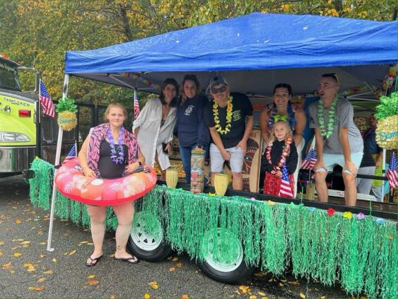 Members of the Branchville Hose Company have fun before the parade. From left are Sheena Trepanning, Kaitlin Frato, Ashley McCullough, Kyle Whitehead, Ashley Delea, Addie Conklin and Cody Conklin.