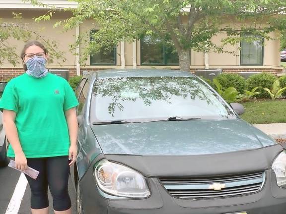 Local woman receives car from Project Self-Sufficiency Katelyn MacLean recently received a used vehicle from Project Self-Sufficiency (Photo provided)