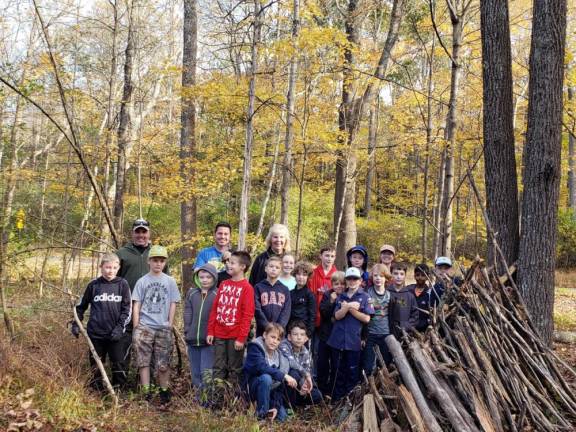 Pack 96 Scouts learned earned badges by participating in a volunteer experience this fall.