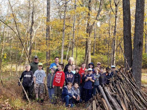 Pack 96 Scouts learned earned badges by participating in a volunteer experience this fall.