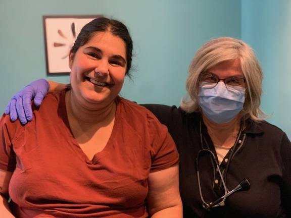 ‘We can’t help everybody’ Midwife Susanrachel Birdie Condol with client Anique Nicholson. Midwives have to consider their scheduled clients when deciding whether to take on more.