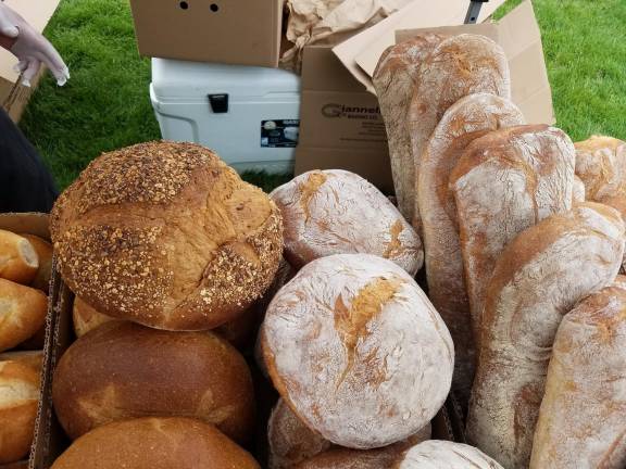 Fresh baked bread are among the many fresh items at the Farmer's Market at The Shoppes at Lafayette.