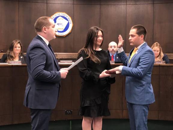 NW3 John-Paul Couce is sworn in as the new mayor of Newton at the Town Council’s annual reorganization meeting Thursday, Jan. 4. (Photos by Kathy Shwiff)