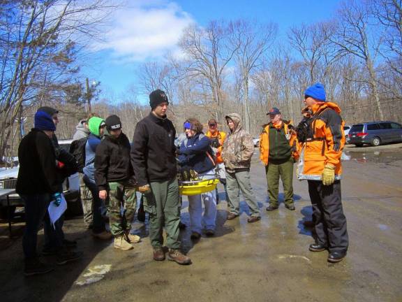 Scouts learn search and rescue Crew members Sam Brothman, Thomas Seltzer, John Lutz, James Watson, Emily Brothman, Crew Vice President of Public Relations Stephen Rozek and Crew President Chris Rozek (acting as the medic) carry a victim of a back injury Crew Vice President of Admin Katie Rozek.