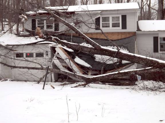 Council discusses abandoned house situation An abandoned house on Sleepy Hollow Road in Cranberry Lake. The tree has since been removed, but the house has been declared beyond repair and is slated for demolition.