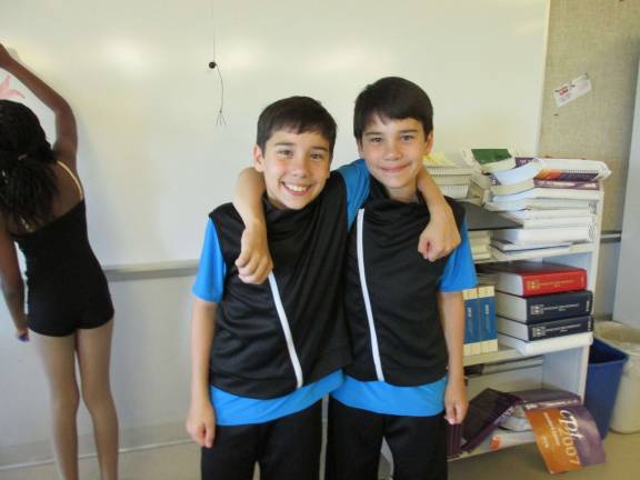 D'Marge dancers welcome summer with recital Andrew and Anthony Carlson, of Newton, are ready for "Cruisin' For A Bruisin.'"