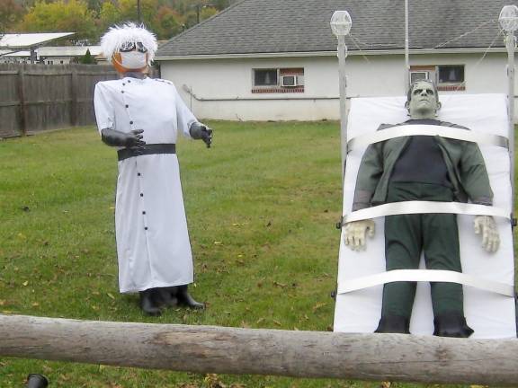 Dr. Frankenstein and his spooky creation are a perfect Halloween venue in one Branchville resident’s front yard (Photo by Janet Redyke)