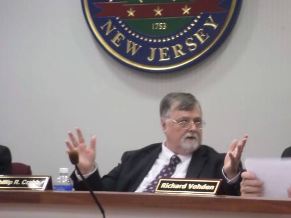 Freeholders settle solar suit Sussex County Board of Freeholders Director Phillip Crab (R-Franklin), gestures while discussing his vote in favor of a multi-million dollar settlement with Power Partners Mastec over a $27.7 million solar panel project. Photo by Nathan Mayberg