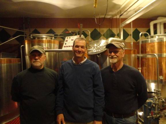 Krogh’s brewery celebrates 15 years with cave-aged brew Krogh's brewers David Cooper and Bud Usinowicz with owner Bob Fuchs in the brewery.