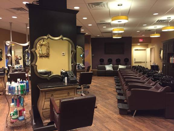 Where every day is a great hair day Interior of newly relocated and renovated Mancuso Salon & Spa.