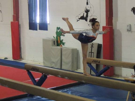 Giant Gymnastics' 3rd annual Gator Bowl Gianna Macones, of Sparta, on the balance beam.